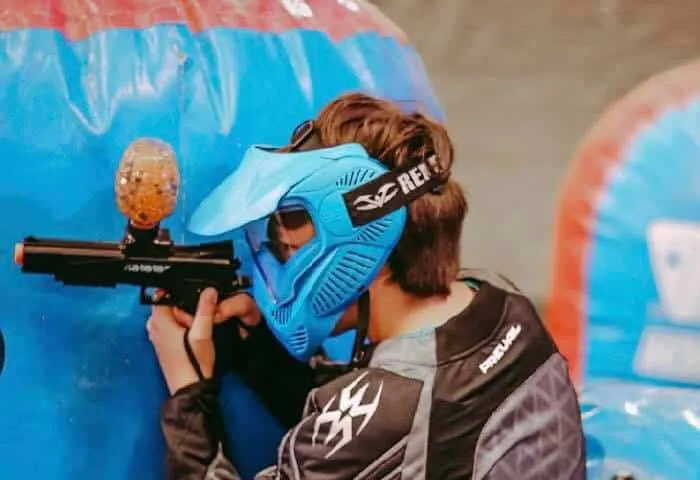 GameTruck GelTag party with kids behind inflatable obstacles