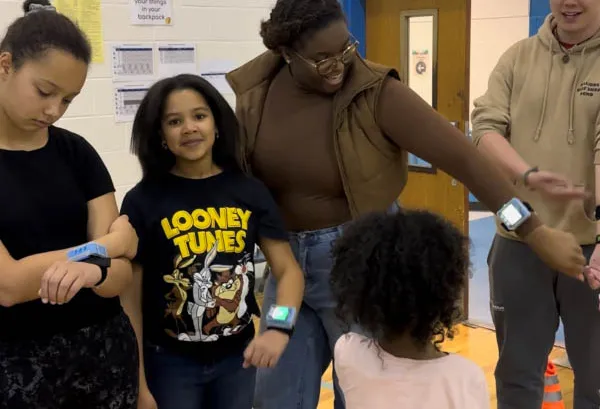 Kids competing in a ZTAG challenge at a GameTruck event