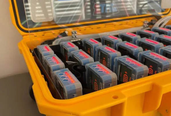 GameTruck ZTAG wristband tracker close-up during a game