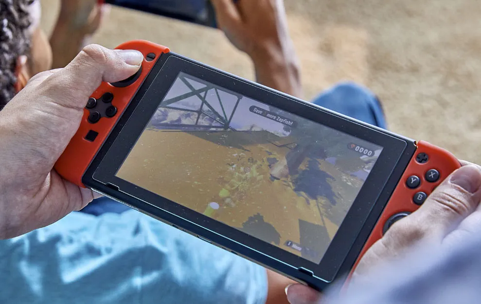 Kids enjoying Nintendo Switch games at an @HOME party