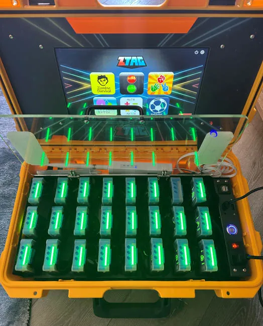 Kids competing in a ZTAG challenge at a GameTruck outdoor party