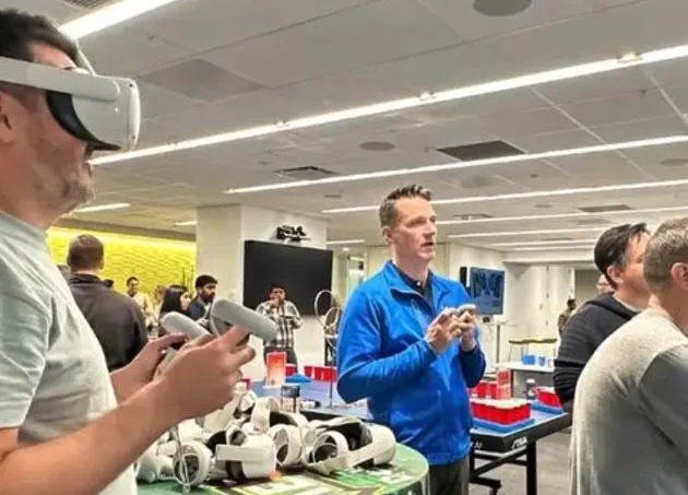 Young corporate team celebrating after video game tournament at GameTruck team building event